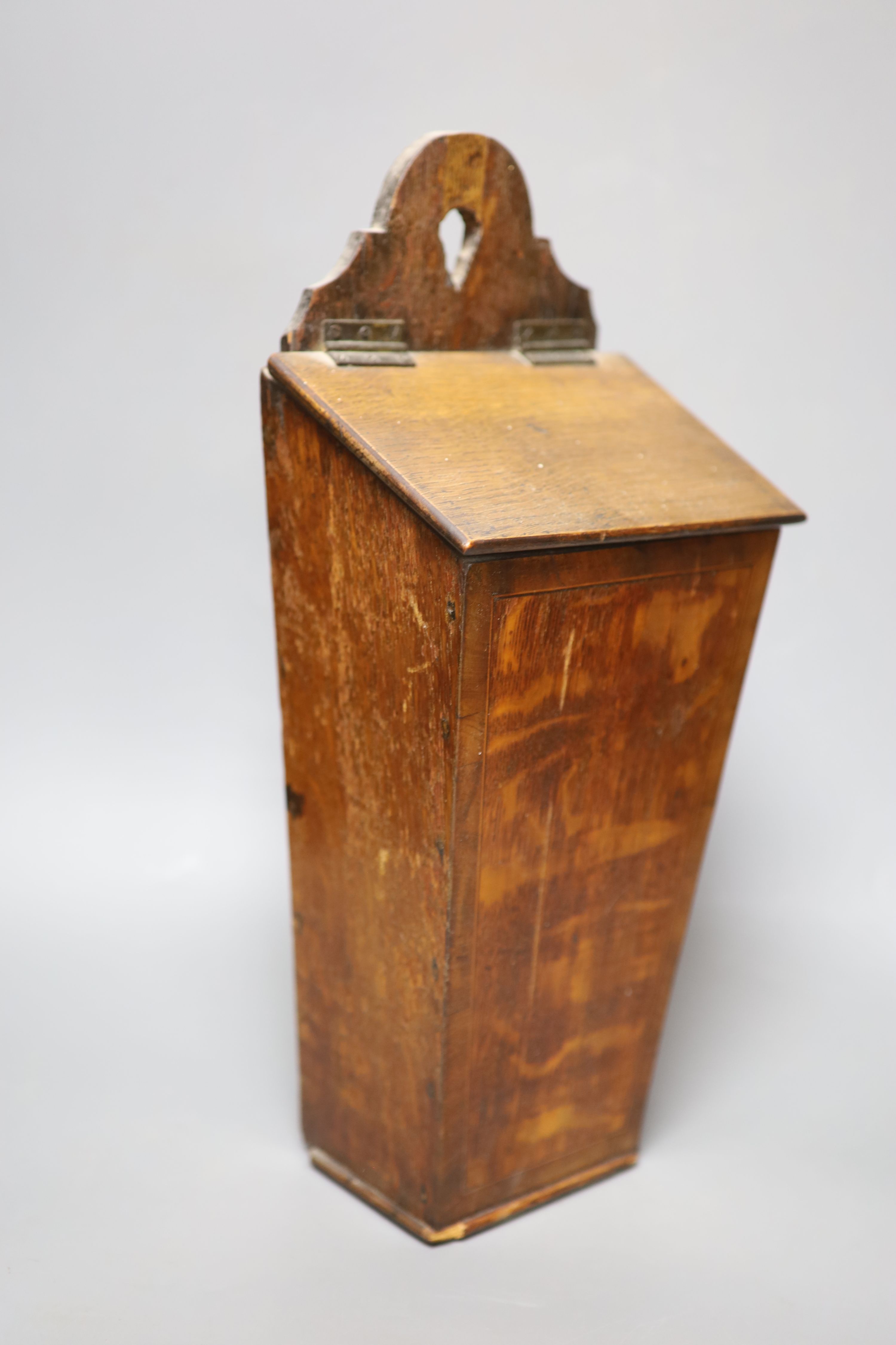 A Victorian cast brass girandole and an early 19th century mahogany candle box, longest 42cm